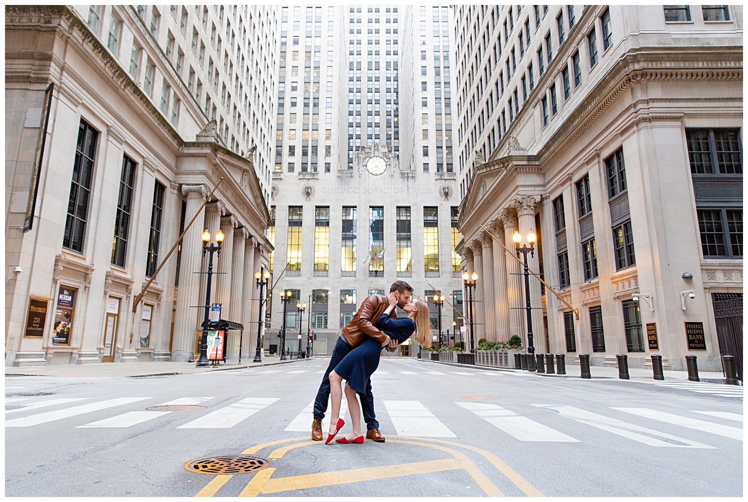 couple sharing a kiss in the middle of the street