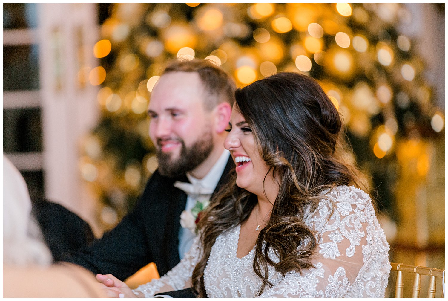 bride laughing during toast