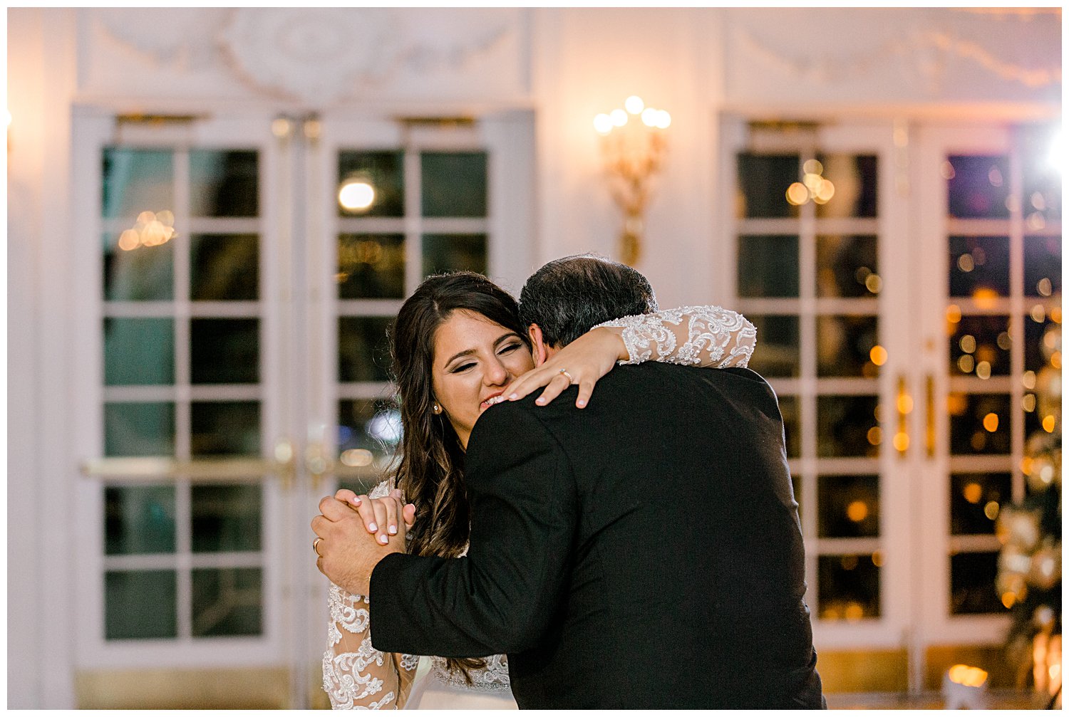father of bride and bride dancing