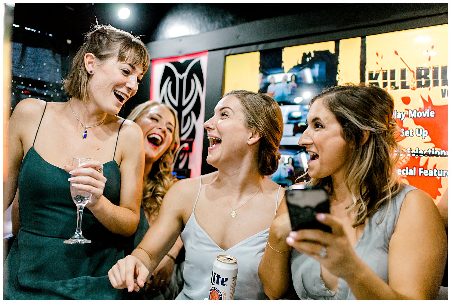 wedding party celebrating on party bus